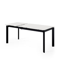 Mesa Alba blanco/negro, vista en tres cuartos con la extensión abierta